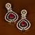 Ruby Embellished Black and Rose Gold Plated American Diamond Earrings 216ED365