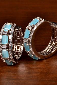 Rhodium Plated American Diamond and Sky Stone Embellished Designer Hoops 216ED379