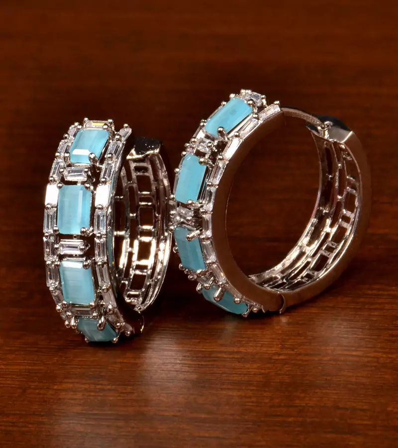 Rhodium Plated American Diamond and Sky Stone Embellished Designer Hoops 216ED379