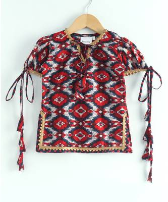 ikkat print red kurti with a dotted black and red triple layered sharara and red dupatta 2