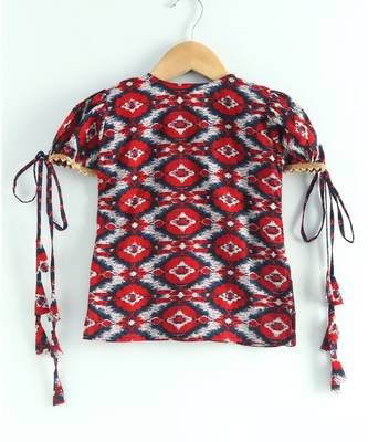 ikkat print red kurti with a dotted black and red triple layered sharara and red dupatta 5