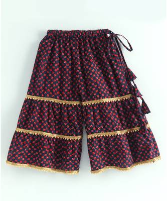 ikkat print red kurti with a dotted black and red triple layered sharara and red dupatta 6