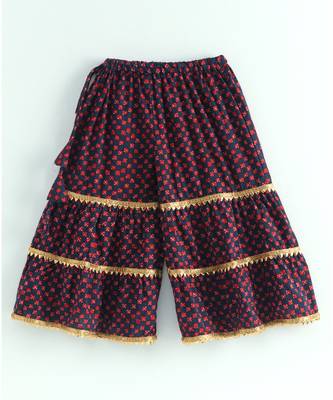 ikkat print red kurti with a dotted black and red triple layered sharara and red dupatta 7