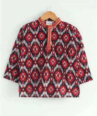 red ikkat print kurta with a red dhoti 2