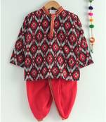 red ikkat print kurta with a red dhoti