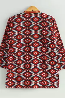 red ikkat print kurta with a white pajama
