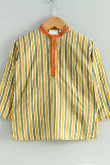 yellow striped kurta with a mustard dhoti