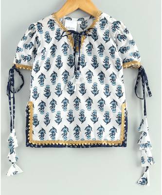white printed kurti with a triple layered bandhini sharara and a blue dupatta 4