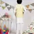 Yellow Printed Silkmul Bandi with Off white Cotton Silk Kurta and Off white Cotton Silk Churidar