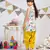 Cream Printed Crepe Short Kurta with Lime Green Silkmul Salwar and Cream Printed Chiffon Dupatta
