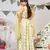 Cream Printed Silkmul Choli and Lehenga with Pale Yellow net Dupatta
