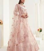 Peach embroidered net semi stitched lehenga