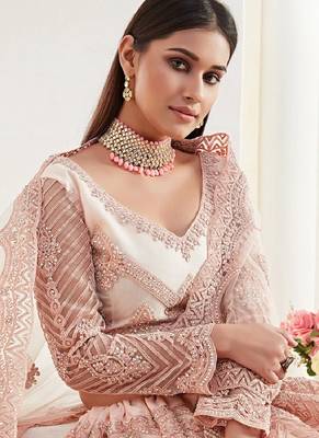 Peach embroidered net semi stitched lehenga 4
