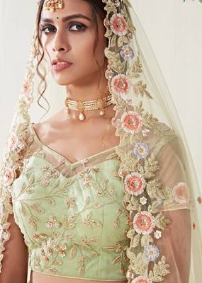 Green embroidered net semi stitched lehenga 3