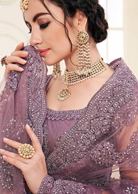 Purple embroidered net semi stitched lehenga 2