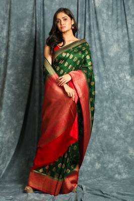 Green woven silk blend saree with blouse 1