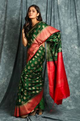 Green woven silk blend saree with blouse 2