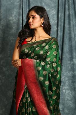Green woven silk blend saree with blouse 4
