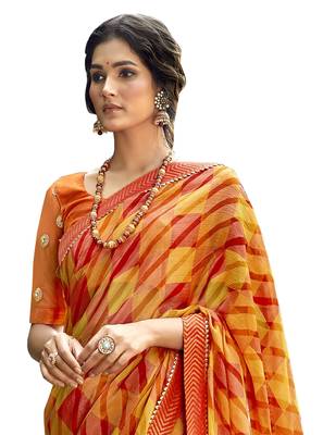 Orange printed brasso saree with blouse 2