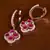 Rose Gold Plated American Diamond and Ruby Embellished Danglers 216ED395