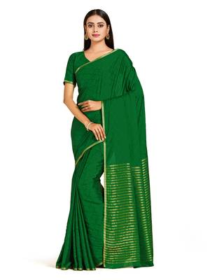 green hand woven crepe saree with blouse 1