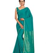 teal hand woven crepe saree with blouse