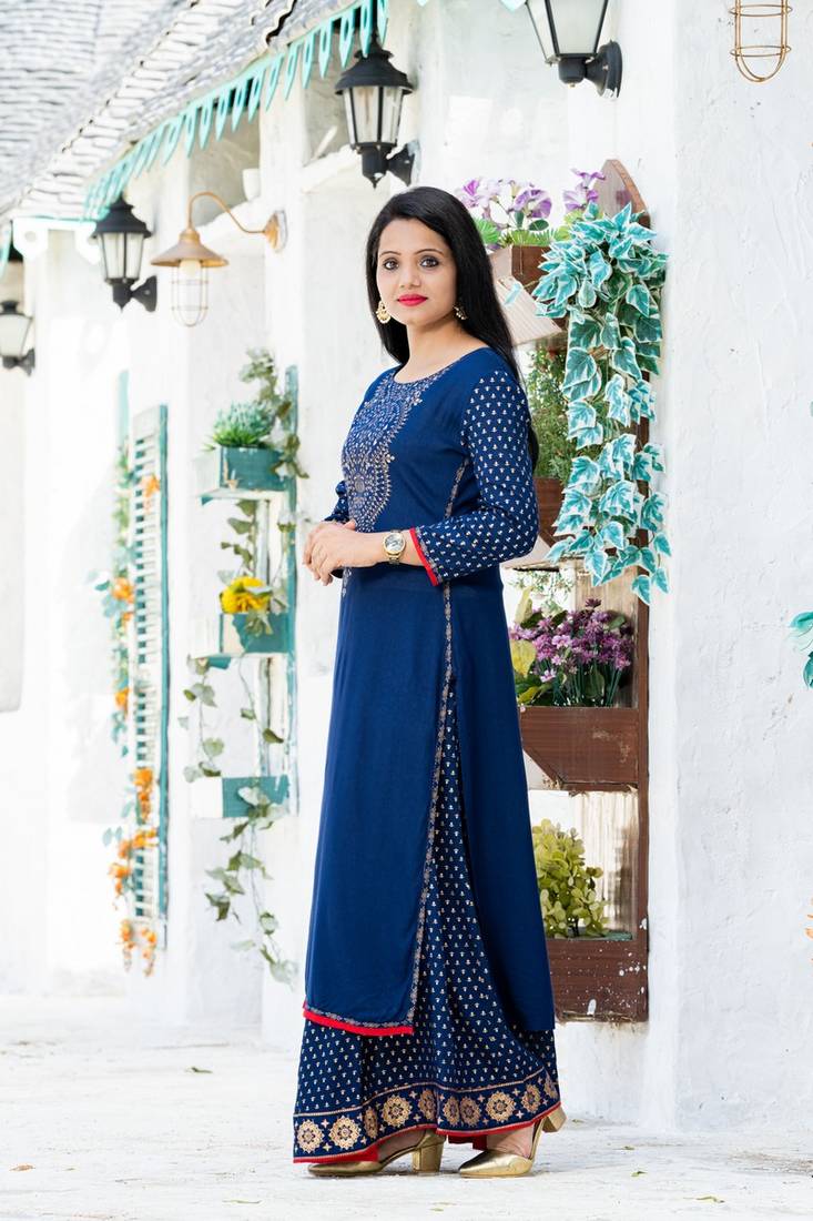 Addiction Navy Rayon Printed Kurta Paired With Beautifully Printed Flared Skirt