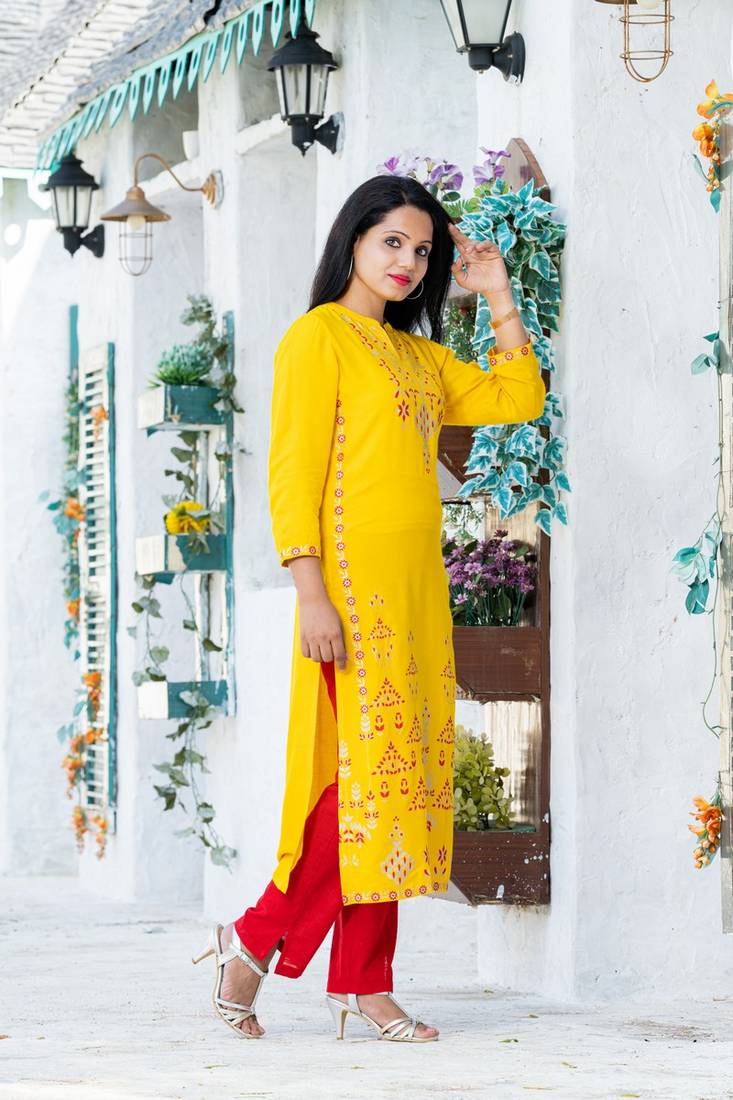 Addiction Yellow Rayon Glitter Printed Straight Kurta Paired With Solid Red Pant