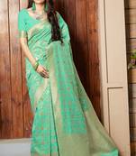 Turquoise woven banarasi silk saree with blouse