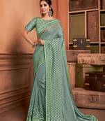 Green embroidered silk blend saree 