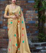 Beige woven banarasi silk saree with blouse