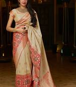 Beige woven banarasi silk saree with blouse