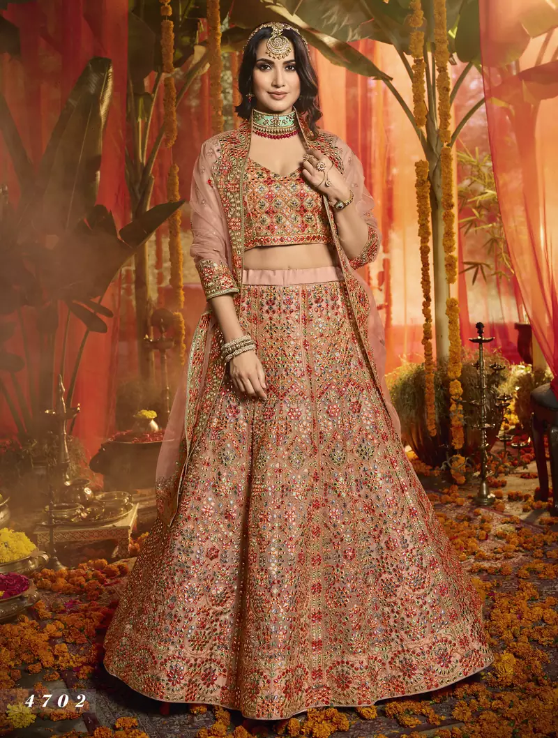 Peach Heavy thread, foil mirror, beads, dori Embroidered pure organza Semi Stitched bridal lehenga