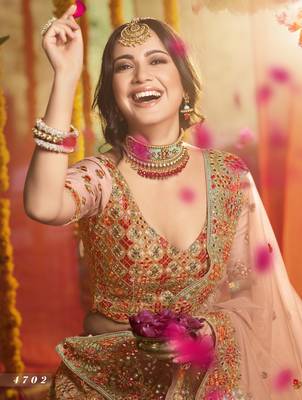 Peach Heavy thread, foil mirror, beads, dori Embroidered pure organza Semi Stitched Bridal Lehenga 4