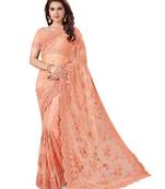 Peach embroidered net saree with blouse