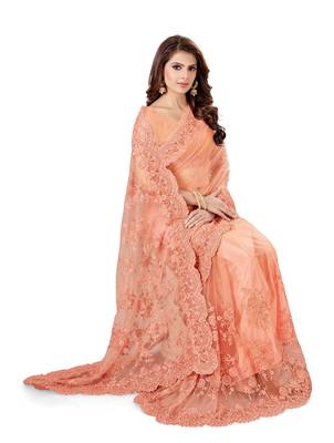 Peach embroidered net saree with blouse 3