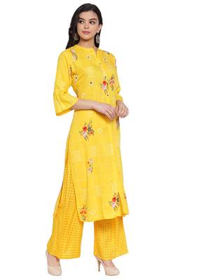 Yellow printed rayon kurtas-and-kurtis 3
