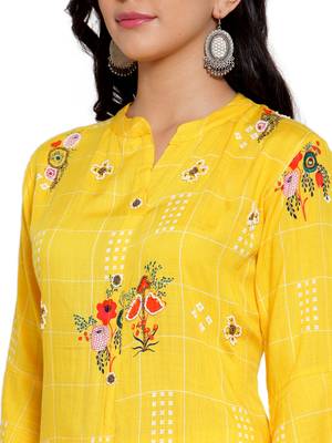 Yellow printed rayon kurtas-and-kurtis 4