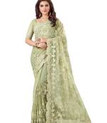 Green embroidered net saree with blouse
