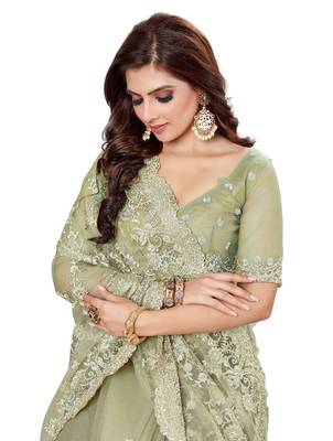 Green embroidered net saree with blouse 4