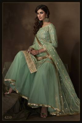 Mesmerizing Green sequins embroidered net Salwar Kameez Designs 2