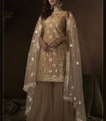Catching Beige sequins embroidered net fabric sharara suit