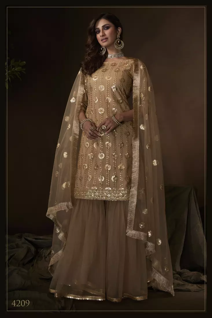 Beige sequins embroidered net sharara suit