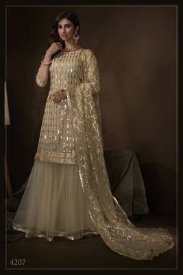 Beige sequins embroidered net sharara suit 1