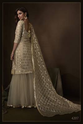 Beige sequins embroidered net sharara suit 3