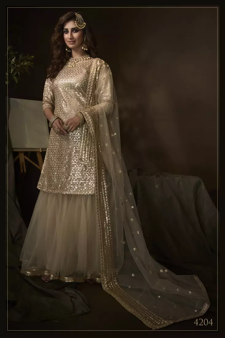 Beige sequins embroidered net sharara suit