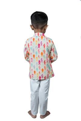 fish print with wooden buttons and white patiala 2