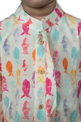 fish print with wooden buttons and white patiala 4