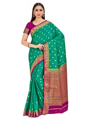 green hand woven crepe saree with blouse 1