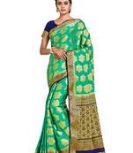 green hand woven crepe saree with blouse